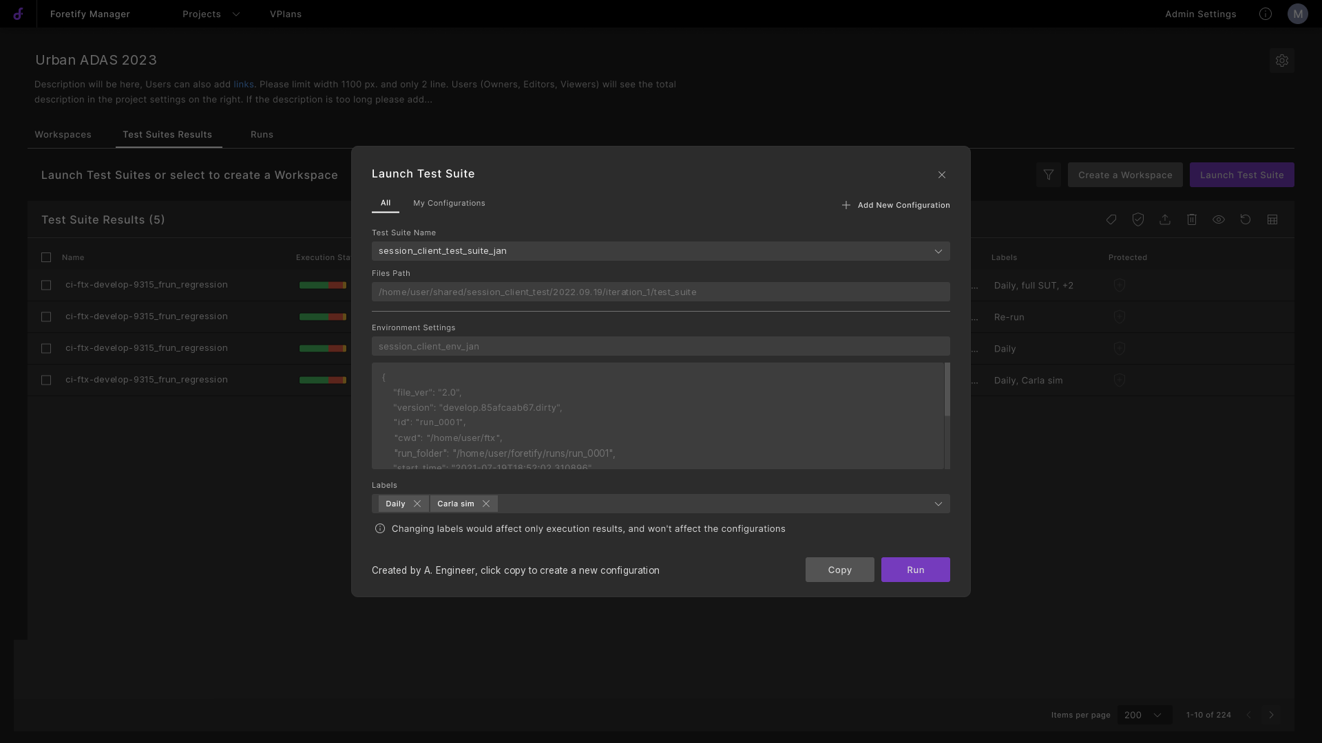 2023: the Launch Test Suite modal on the results page, with environment settings pasted as raw JSON
